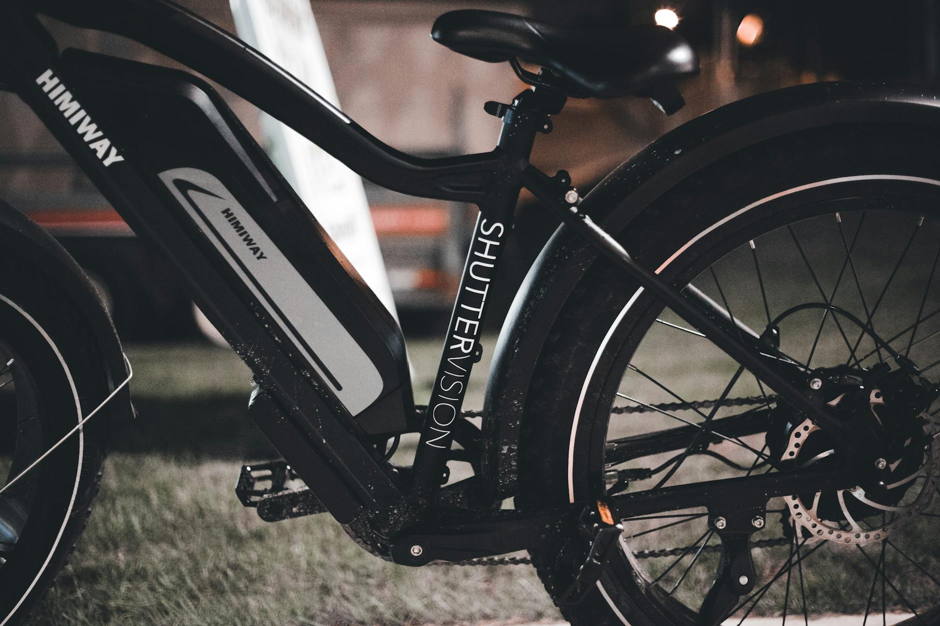 Detailed close-up of a Himiway electric bicycle showcasing its design and features at night.